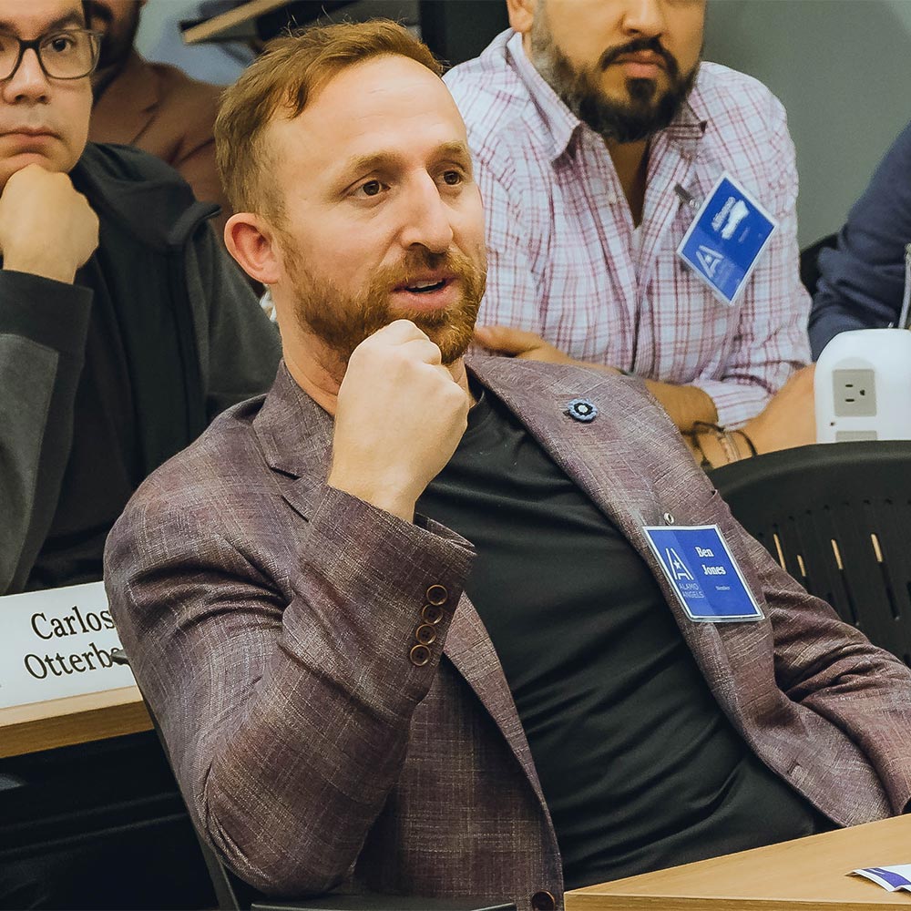 Project Cowork client sits in a training